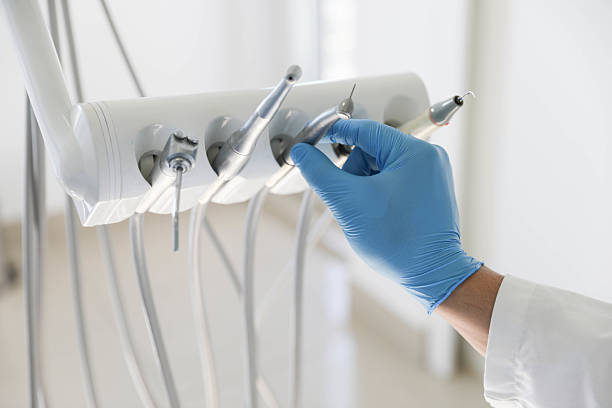Professional Tooth Extraction technician working in Tulare, CA